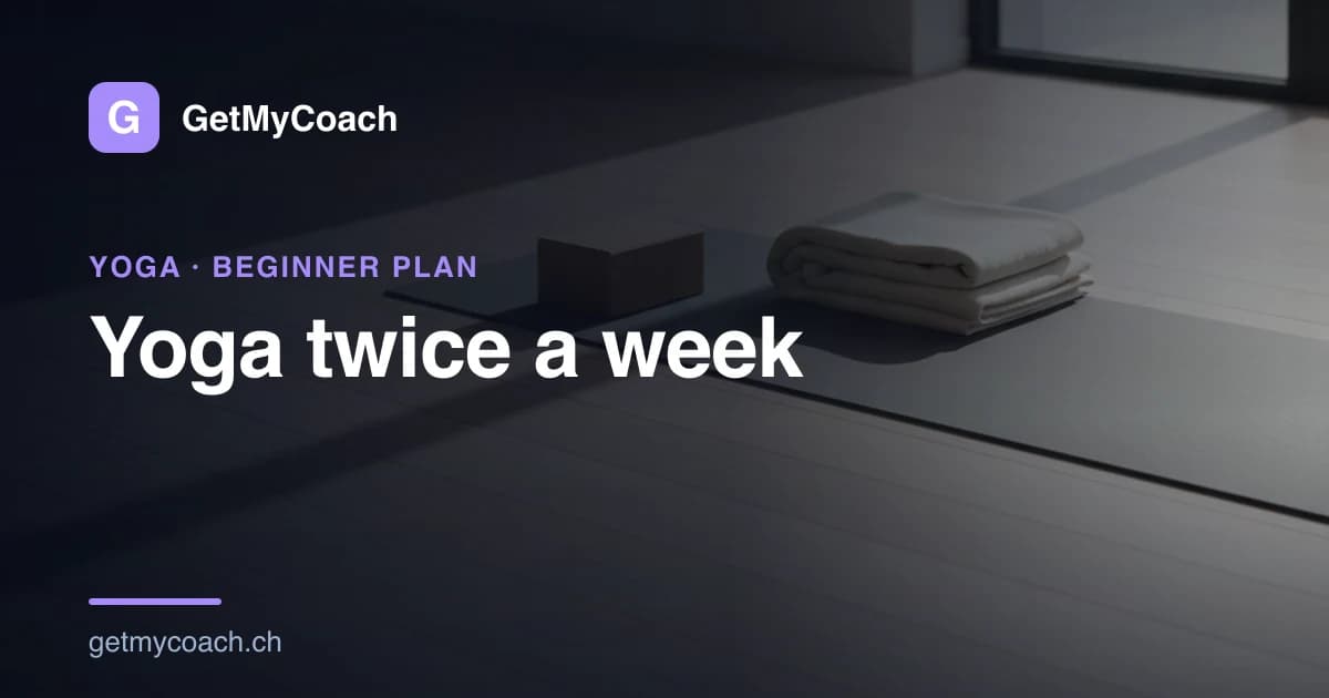 A dark exercise mat unrolled on a pale floor in a quiet room, a low block and a stack of folded white blankets resting beside it in soft daylight — cover image for the GetMyCoach beginner yoga plan.