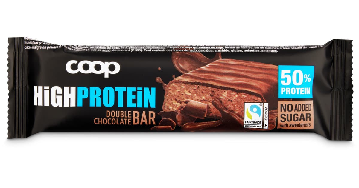 A wrapped Coop High Protein Double Chocolate bar with a 50% protein claim printed on the dark wrapper.